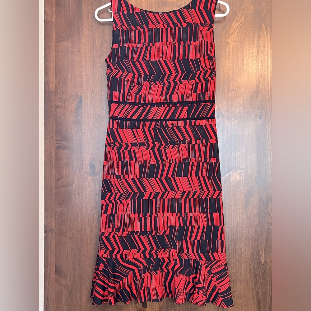 Taylor dress. Only worn a couple of times. Super cute.